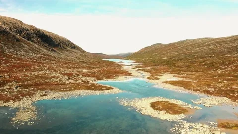 4k tundra drone, alpine stream footage, rocky valley river Video stock 309277519