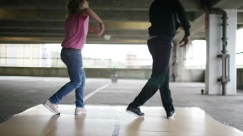 4K Two breakdancers practising a routine in sync, shot on RED EPIC DRAGON Stock Footage 54693031