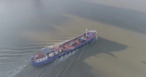 [4K] Two Drone Shots of a Commercial Ship on the Thames, London Stock Footage 138962299
