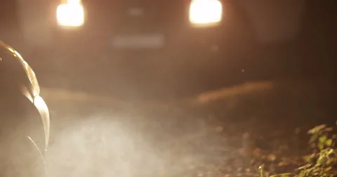 4k, two mechanics arrive to fix a broken down car late at night Stock Footage 68371487
