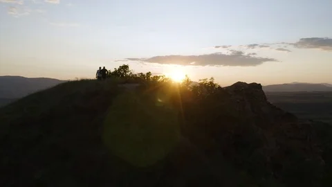4k Two Men Hike Stob Bulgaria at Sunset Pyramids Drone Stock Footage 122464984