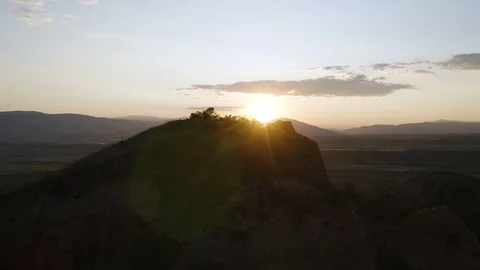 4k Two Men Reach the Peak of Stob Earth Pyramids Bulgaria Drone Sunrise Stock Footage 122464970