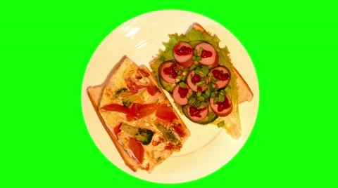 4k two opened sandwiches with omelette, vegetables, sausages, ketchup on plate Stock Footage 49610620