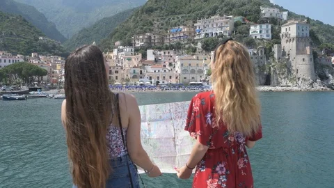 4K two young girls exploring Amalfi coas... | Stock Video | Pond5