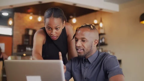 4k Two young people in coffees shop, working on laptop. Stock Footage 111330987