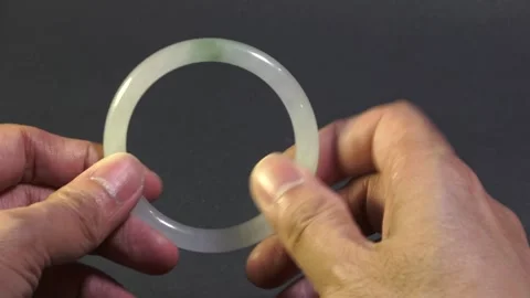 4K Type B Jadeite Bangle Breached Treated Jade Stock Footage 284351681