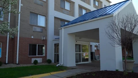 4K typical day time establishing shot of typical hotel lobby entrance outside Video stock 114230589