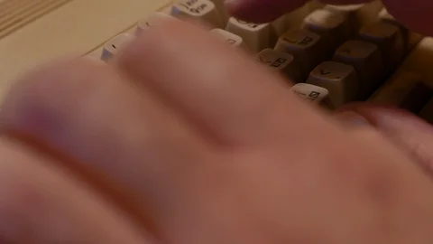 4K Typing on Retro Computer Keyboard 2 Stock Footage 122524908
