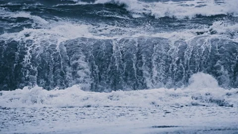 4K-UHD 5x slow motion: Arctic Ocean waves on back sand beach Stock Footage 164761891