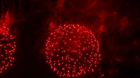 4K UHD - 60fps or 30fps - Large red pyrotechnic balls exploding in night sky Stock Footage 40904075