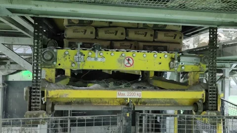4K UHD Automated Palletizer Stacking Cement Bags in a Factory Stock Footage 331948461