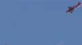 4K UHD catchup tracking to red stunt plane in air show 4k or 4k+ Resolution