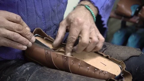 4K UHD Close up of Shoemaker Who Making Shoes Stock Footage 71718982