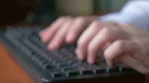 4k UHD - Close-up of a young man hands typing on a laptop keyboard Stock Footage 46743034