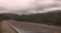 4K UHD desolate desert rolling road winter storm clouds old yellow VW bug 4k or 4k+ Resolution
