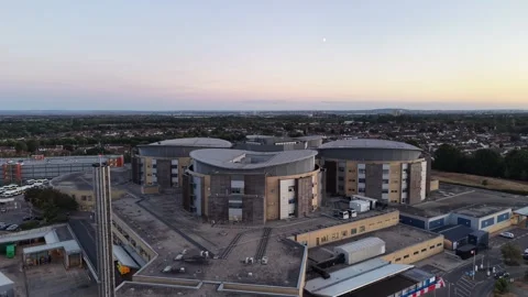 4K UHD drone push-in shot flying smoothly forward towards Queens Hospital in Stockbeeldmateriaal 345078589