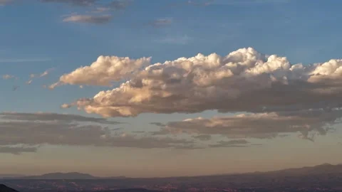 4K UHD Drone Timelapse: Warm Sunset Colors On Long Cloud Over Southwest Desert Stock Footage 337707473