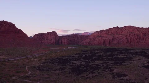 4K UHD drone view of Snow Canyon State Park at dusk Stock Footage 75543407