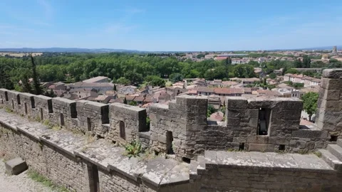 4K UHD dynamic ascending shot along medieval stone castle battlements Stock-Footage 347137965