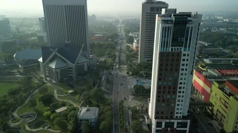 4K UHD Fly backwards over town Stock Footage 226308384