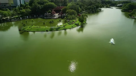 4K UHD fly over lake to small island Stock Footage 227750727