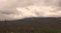 4K UHD gloomy winter clouds  mountain saguaro cactus real time medium tight. 4k or 4k+ Resolution