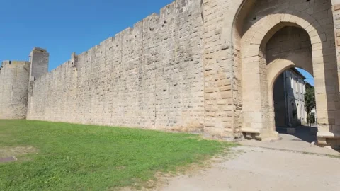 4K UHD handheld horizontal panning shot of medieval stone castle wall Stock-Footage 347126537