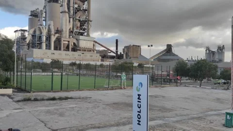 4K UHD Holcim Cement Factory with Football Pitch and Cloudy Sky 動画素材 331953853