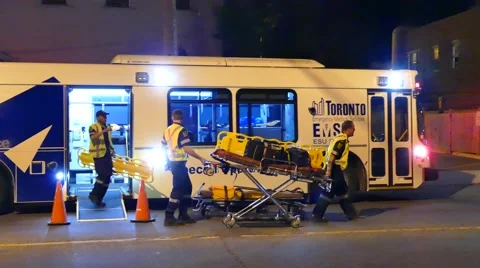 4K UHD - Large bus-converted ambulance with paramedics Video stock 56441477