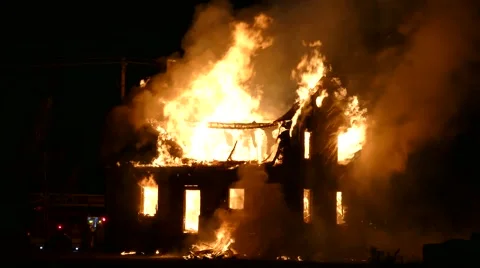 4K UHD - Large window frame falling while on fire  Stock Footage 50560796