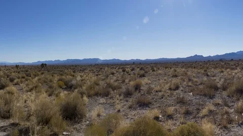 4K UHD looking towards Area 51 surrounding mountains pan Video stock 71656969