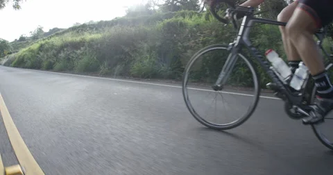 4K UHD: Man Biking Up Hill/Stabilized Motion Gimbal Movement Stock Footage 63153345