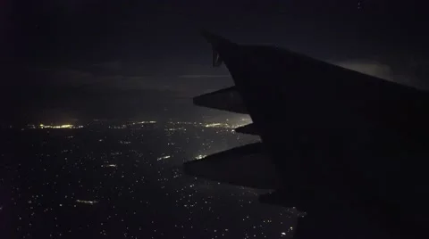 4K UHD Medium Shot Night Time Outside Airplane Window Stockbeeldmateriaal 67431744