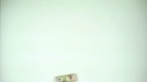 4K UHD Money Falling White Background Stock Footage 72814643