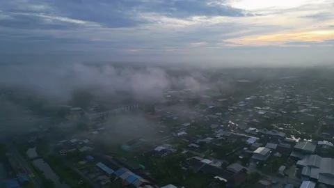 4K UHD morning low cloud in small town sungai besar Stock Footage 227514683