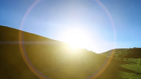 4K UHD mountain meadow timelapse at the summer. Clouds, trees, green grass and Stock Footage 100748686