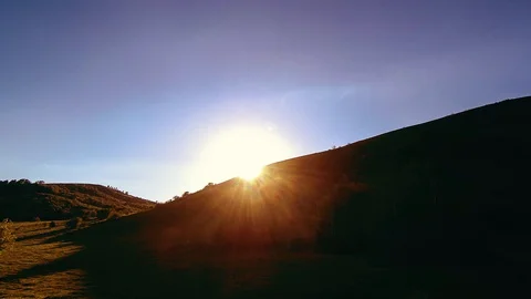 4K UHD mountain meadow timelapse at the summer. Clouds, trees, green grass and Stock Footage 129263078