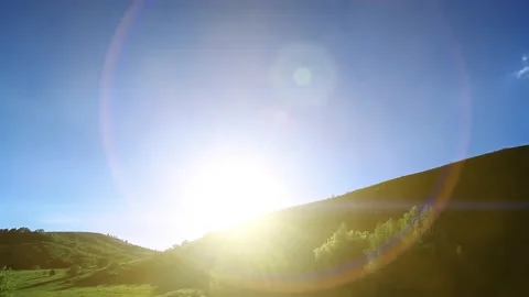 4K UHD mountain meadow timelapse at the summer. Clouds, trees, green grass and Stock Footage 169641624