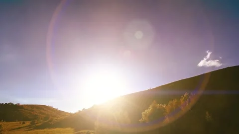 4K UHD mountain meadow timelapse at the summer. Clouds, trees, green grass and Stock Footage 288937123