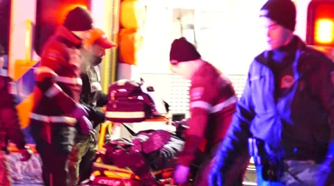 4K UHD - Paramedics performing CPR in freezing temperatures Stock Footage 46261049