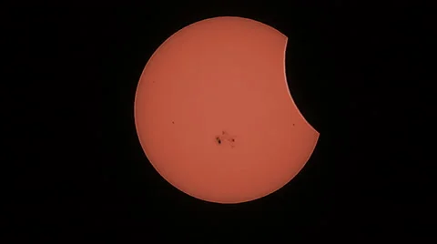 4K UHD partial solar eclipse October 2014 with sun spots real time medium shot Stock Footage 42969584