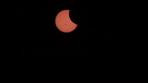 4K UHD partial solar eclipse October 2014 with sun spots time lapse wide shot Stock Footage 42969614