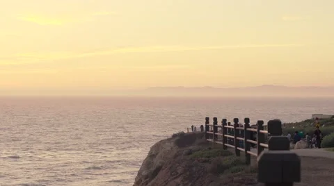 4K UHD Populated Beach Path during sunset in a canyon cliff Stock Footage 62680900