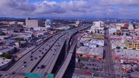 4K UHD right to left drone tracking shot of down town Los Angeles freeway Stock Footage 72312408