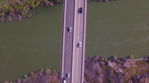 4K UHD rotating over head drone shot of Perrine bridge in Twin Falls Idaho Stock Footage 75544319