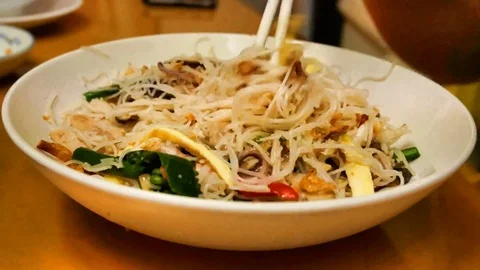 4K UHD Seamless loop - stir fried vermicelli with seafood, meat, vegetables Stock Footage 83114213
