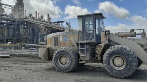 4K UHD SEM 669C Wheel Loader Parked at a Heavy Industry Cement Factory Stock Footage 331942606