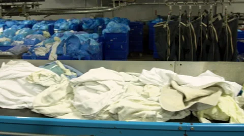 4K UHD shot of workers and clothes in industrial laundry factory 스톡 동영상 49216891