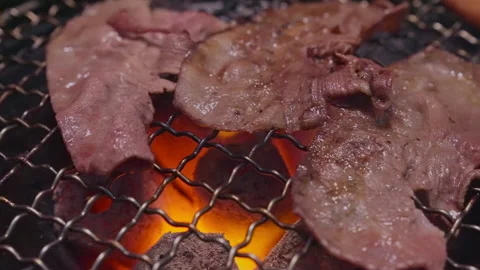 4K UHD Slow motion Dolly shot : Charcoal grilled Kobe Wagyu beef tenderloin s Stock Footage 144323908