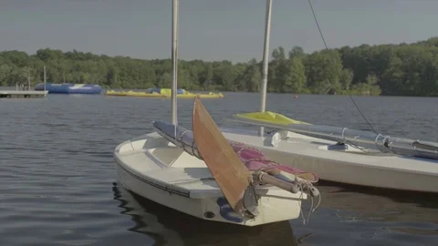 4K UHD Small sail boat in lake Stock Footage 70210128